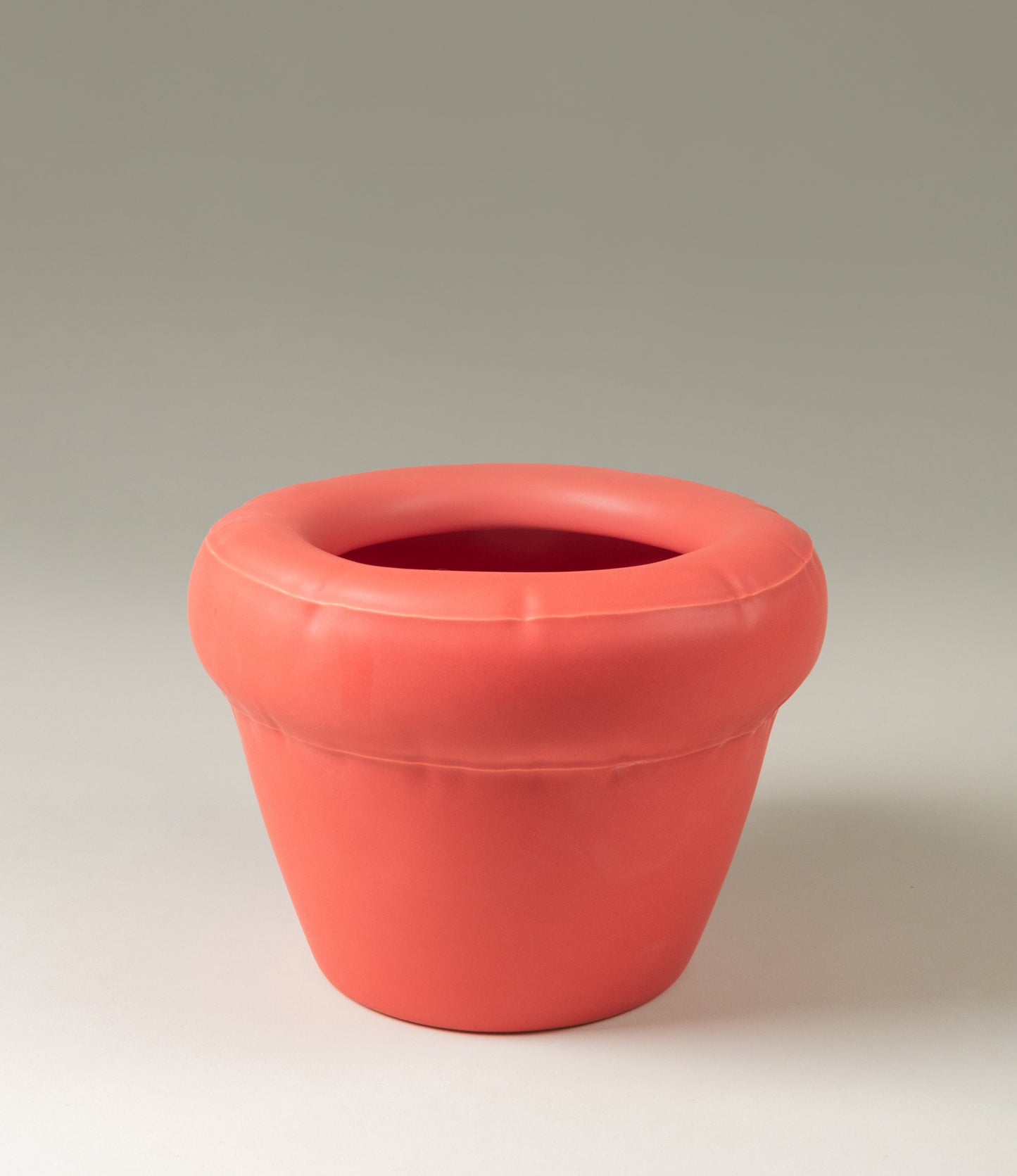 Homestudyo planter pierre in Coral (red  color. The planter design looks like and inflatable ballon although it is made of ceramics